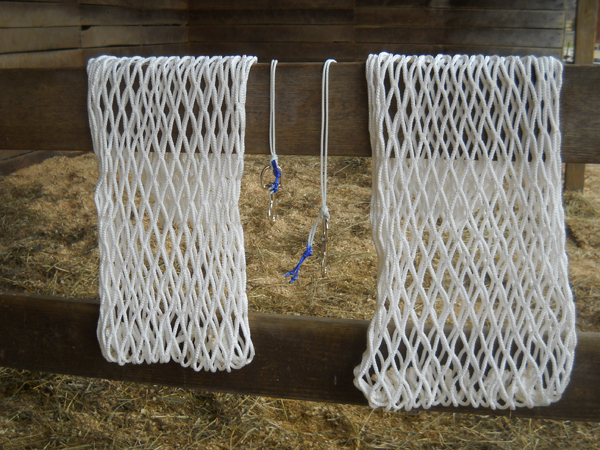 These are two slow-feed hay nets send to me by a reader named Angie. They are put together quite professionally.